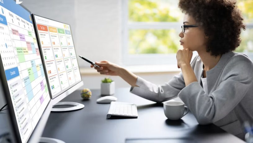 woman looking at a production schedule